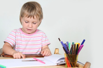 cute child drawing over white