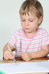 cute child drawing over white