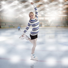 young beautiful woman ice skating