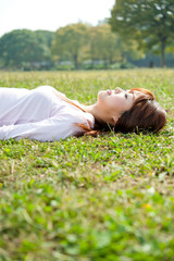 attractive asian woman in the park
