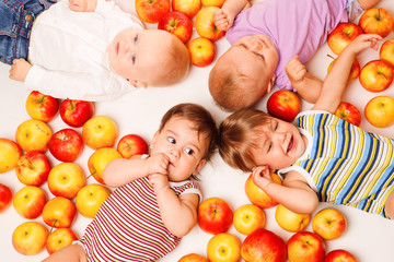 Fototapeta na wymiar Group lying in apples