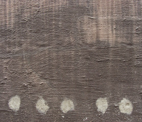 brown pink concrete grunge wall with 5 five white dots