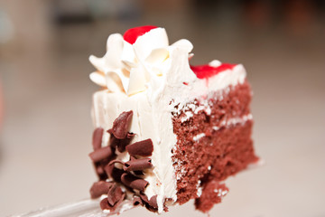 cake and cherries on top .