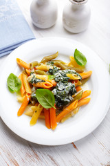 Penne with cream cheese sauce and spinach