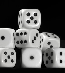 white dice in black back