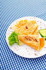 Pancake with pumpkin in plate