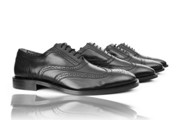Fashion concept with male shoes on white
