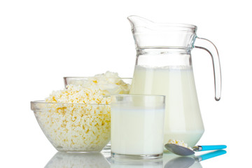 Sour cream, cottage cheese and milk isolated on white