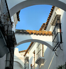 typical street of andalusia in architectural complex pueblo espa