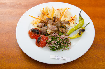 Meat cuisine - kebab served in plate