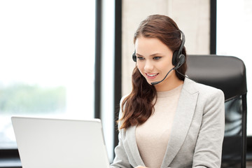 helpline operator with laptop computer