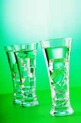Water in the glass against gradient background
