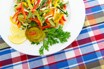 Delicious salad in the plate
