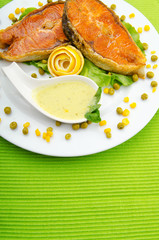 Roasted salmon in the plate