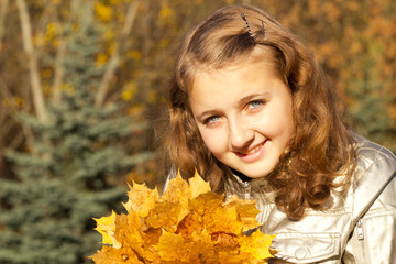 teen girl in autumn park