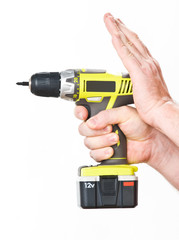 battery screwdriver in hand