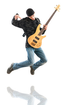 Guitar player jumping in the air © Elnur
