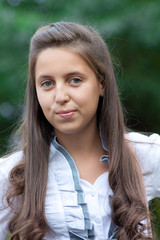 teen with long hair look at me