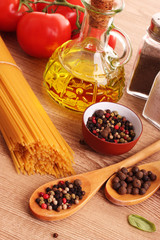 Pasta spaghetti with tomatoes, olive oil, peper  and basil
