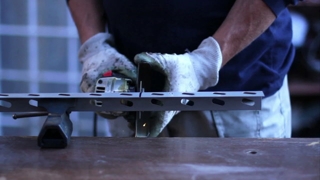 Hands of the smith by the work