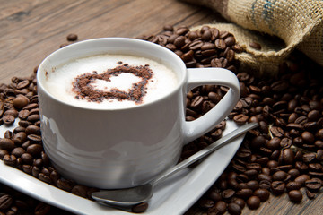 Coffee cup with burlap sack