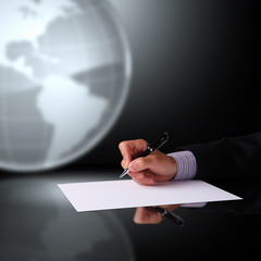 Businessman hand signing documents