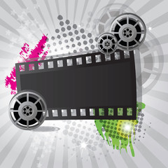 Movie background with film reel and film strip - obrazy, fototapety, plakaty
