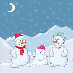 Snowmens in the winter mountains
