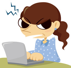 睨む女性とノートパソコン