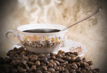 Fototapeta na wymiar Una tazzina di caffè - A cup of coffee