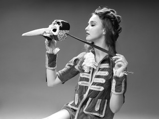 Naklejka premium b&w portrait woman vintage outfit venetian mask