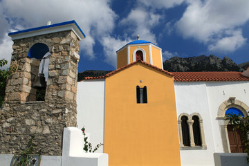 Fototapeta na wymiar The bell tower at the Orthodox church in Zia. Kos Island