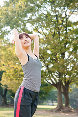 beautiful asian woman exercising in the park