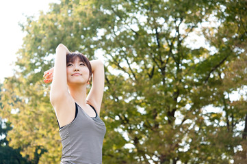 beautiful asian woman exercising in the park