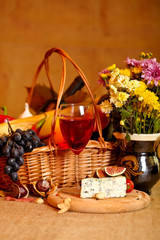 Wine and cheese still life