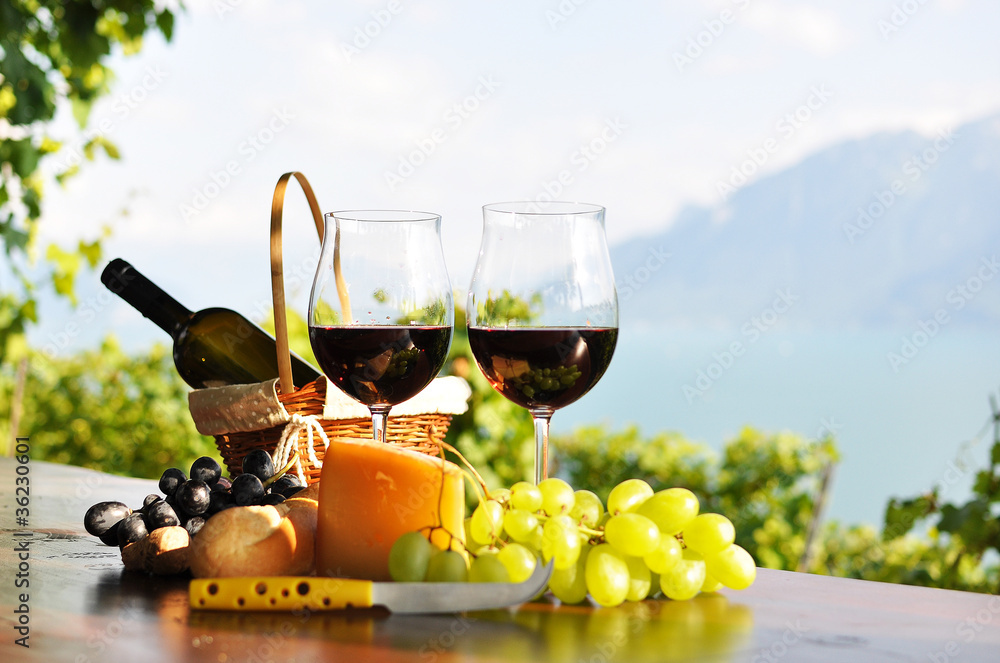 Wall mural red wine, grapes and cheese. lavaux region, switzerland