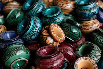 Zelfklevend Fotobehang decorated ashtrays and traditional morocco souvenirs in medina © Elena Moiseeva
