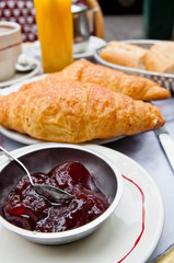 Breakfast with coffee and croissants