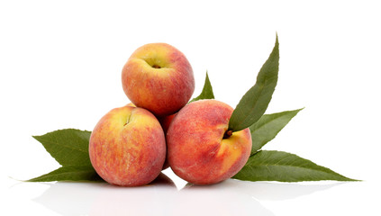Fresh peaches isolated on white