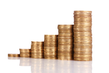 Many coins in column isolated on white