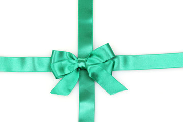 Green  ribbon and bow isolated on white background