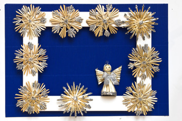 Ornament of woven snowflakes on a blue background