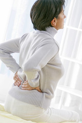 Femme - Mal de dos, lombalgie