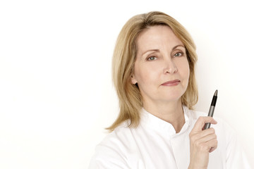 Fototapeta premium Frau in weißem Kittel