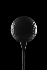 Golf ball on black background