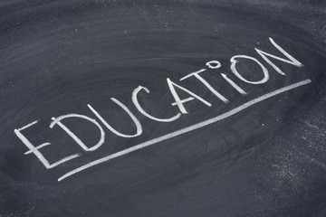 Fototapeta premium education word on blackboard