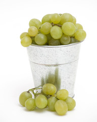 bucket with green grapes