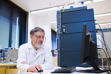 senior male researcher in a lab