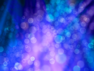 Patches and rays of light blue and purple