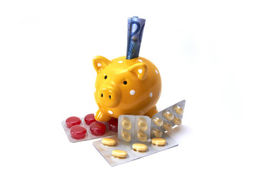 Sparschwein mit Medikamenten